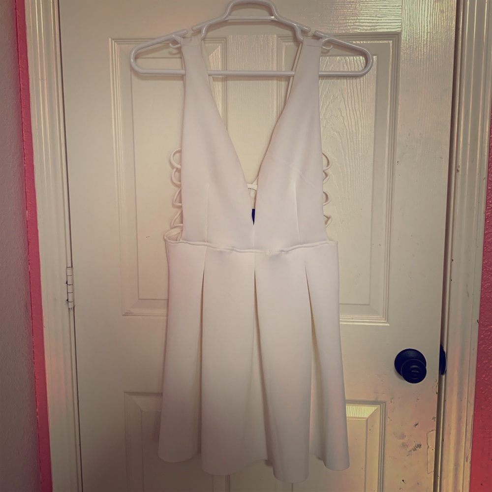 White Knee Length Side Cutout Sleeveless Dress